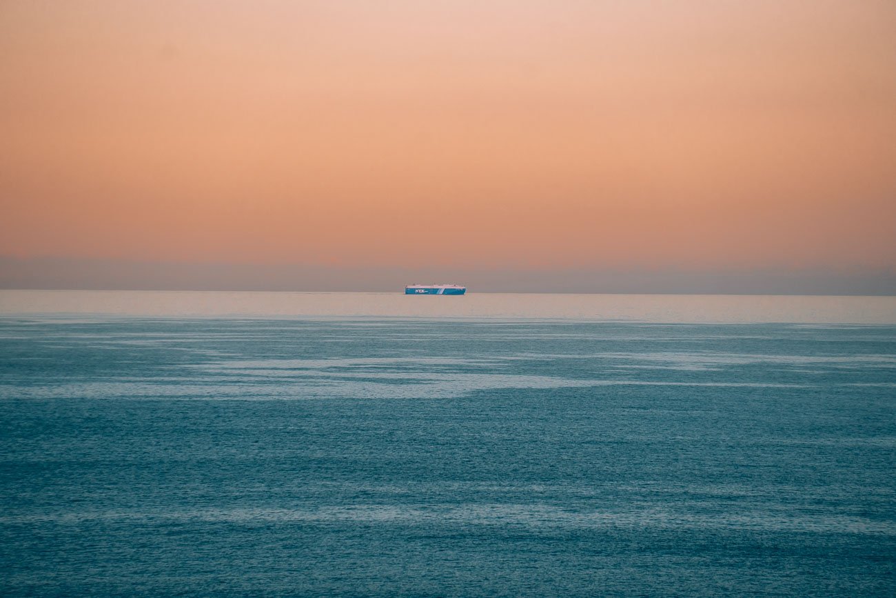 Ship with sunset at horizon at Jamieson Creek2- BLOGPOST-2